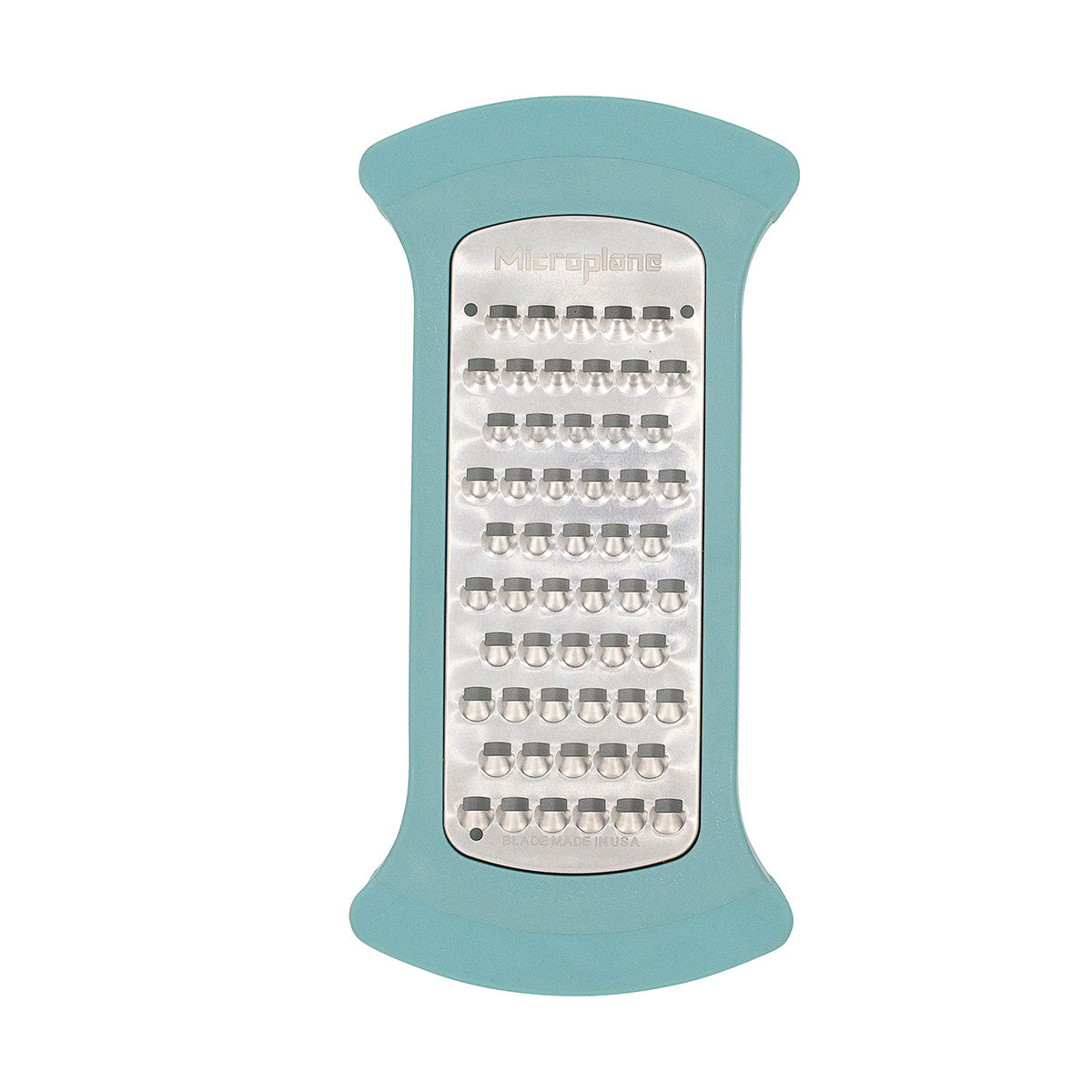 Teal grater with metal surface on a white background