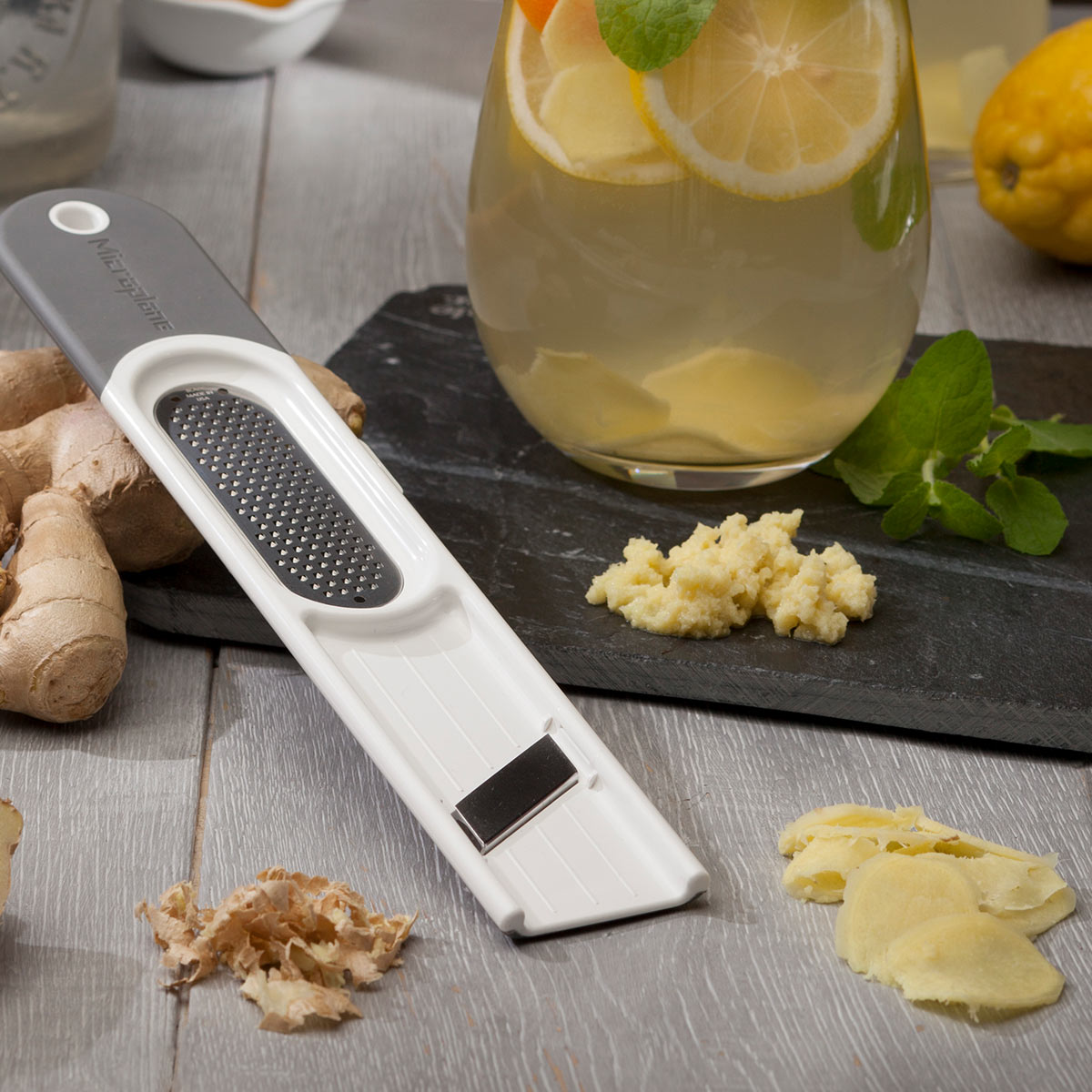 3-in-1 Ginger Tool - Ultra-Sharp Fine Blade, Ginger Slicer, and Peeler with Rubber Foot & Non-Slip Handle