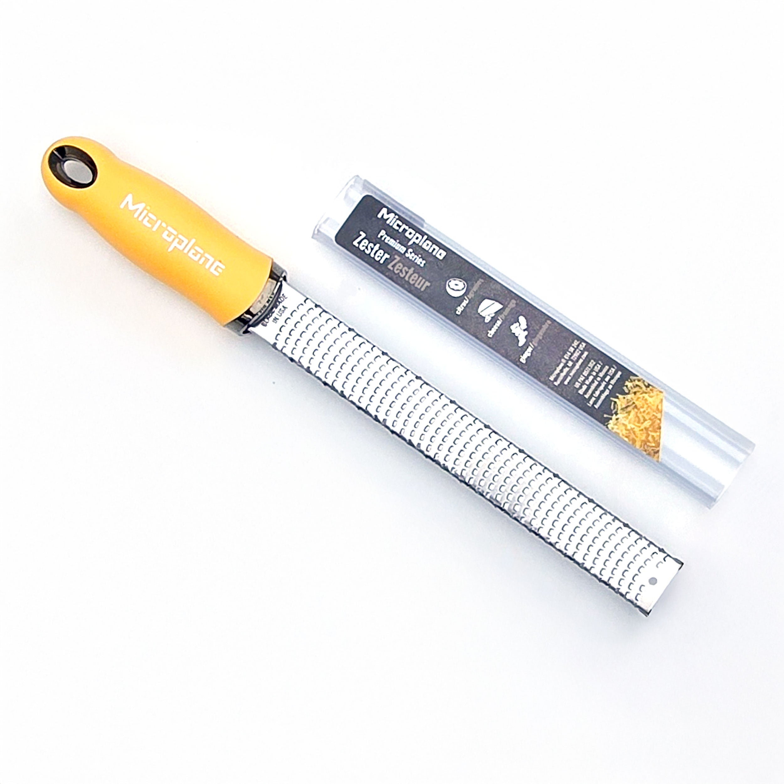Microplane zester with packaging on a white background